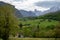 Pouring from high height of natural Asturian cider made fromÂ fermented apples, Asturian cabrales cow blue cheese with view on